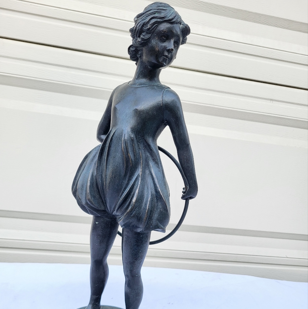This vintage bronze Hula Hoop Girl